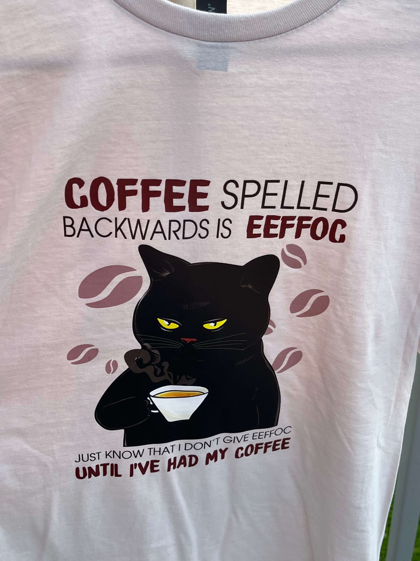 Close up of Funny Coffee Cat T-Shirt Unisex Coffee Spelled Backwards